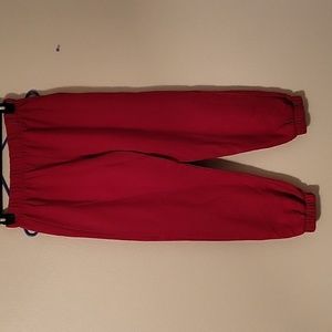 Pair of red sweatpants